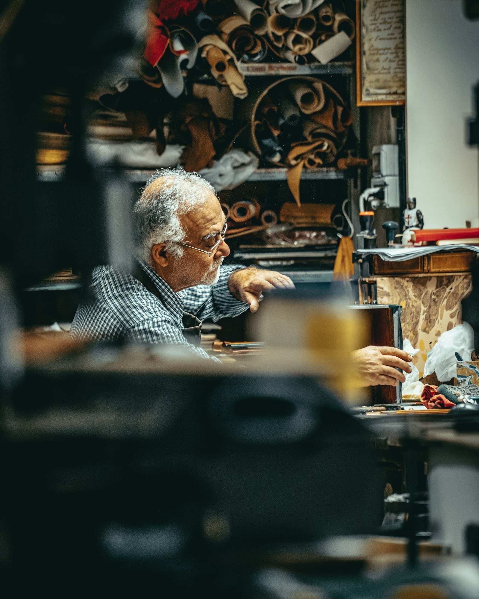 Pierre Corbet, who founded the workshop, at his bench